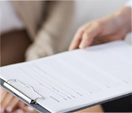 Physicians looking at a patient chart