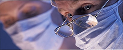 A surgeon in the middle of an operation