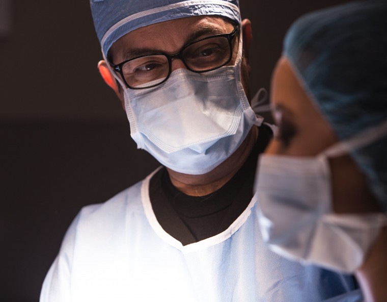 Proctologist (or coloproctologist) during a surgery